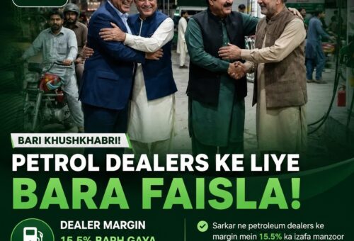 Pakistani officials shaking hands at a petrol station after the dealers' margin increase announcement
