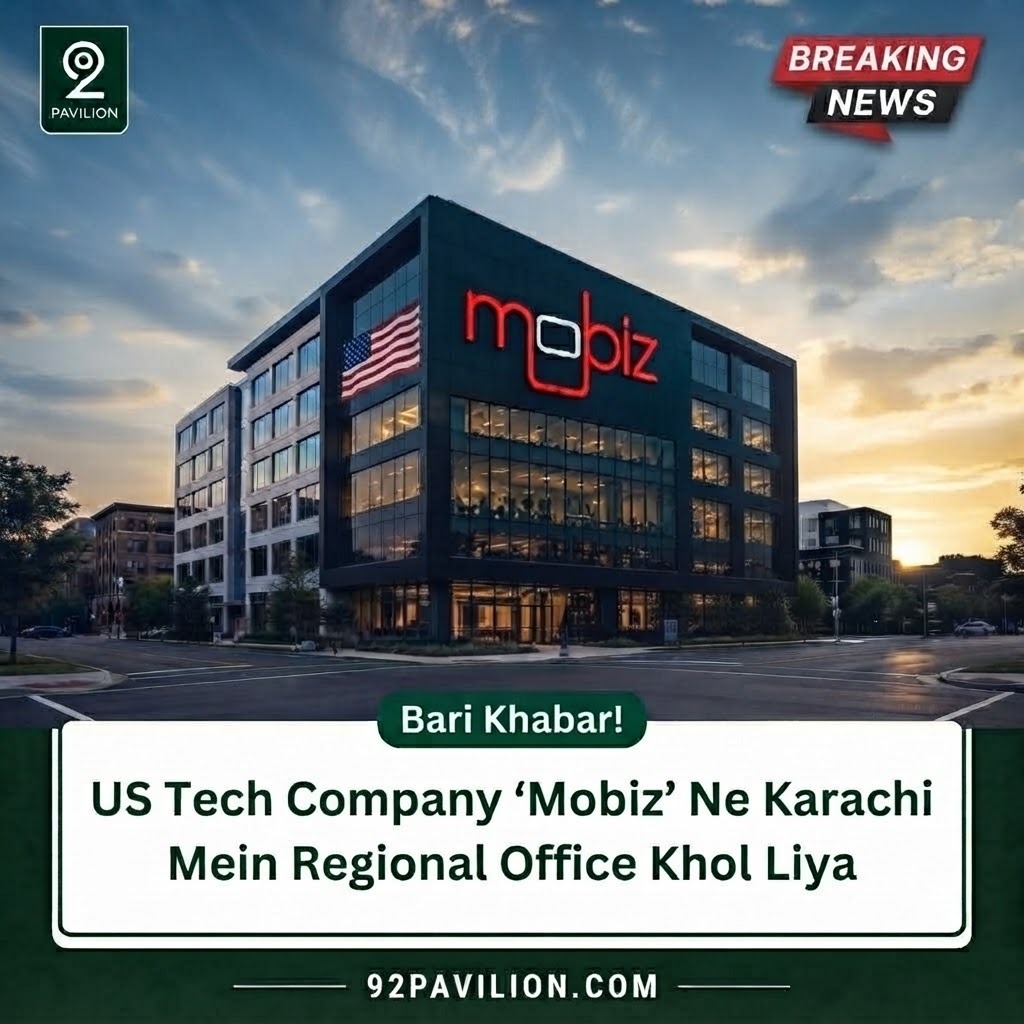 Mobiz office building with illuminated red logo photographed at sunset, marking its new regional office in Karachi